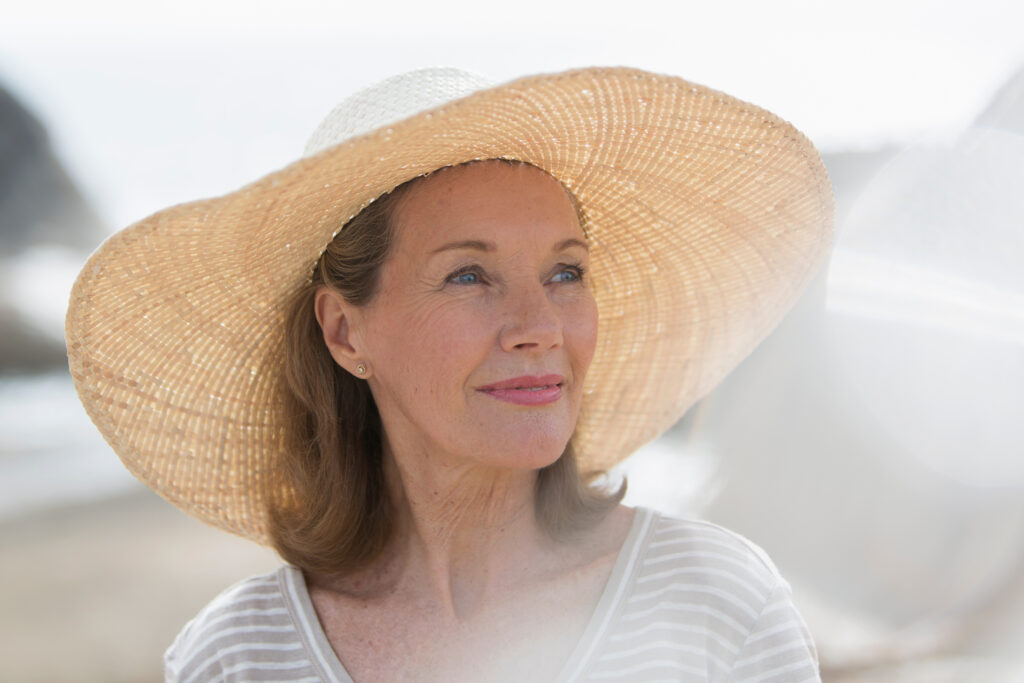 Frau mit Sonnenhut Portrait